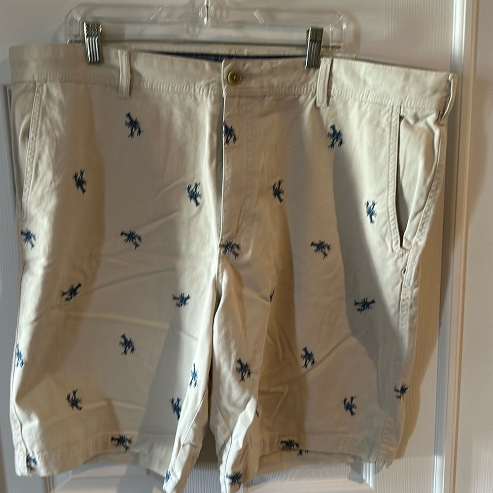 Izod light tan size 42 shorts with lobsters sewn accross shorts.